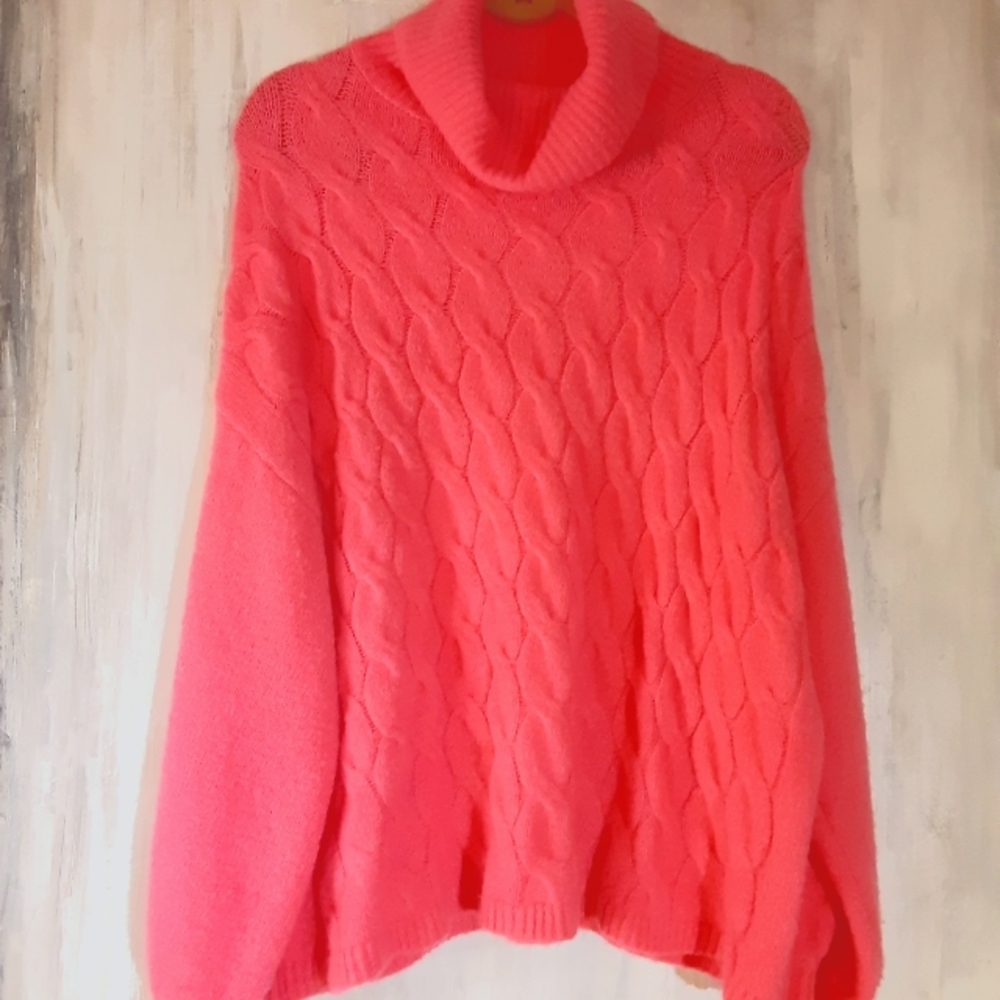 Cozy pink sweater.